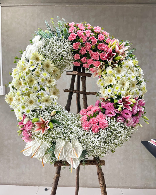 Rosewater Remembrance – Pink Lily & Carnation  Funeral Wreath