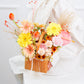 Flower in Hand Wooden Basket | Elvy's Floral Design