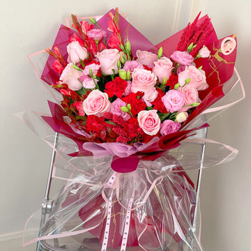 Elegance of Red and Pink Flowers | Elvy's Floral Design